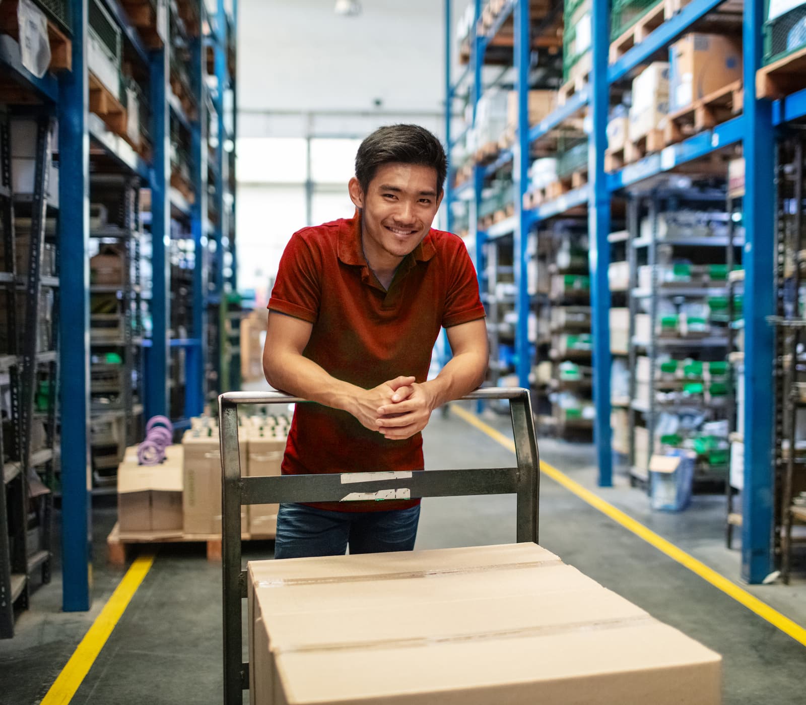 Warehouse worker with packages